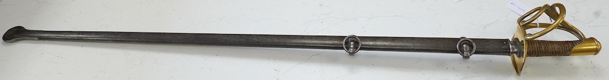 An 1854 French Curassier’s heavy cavalry trooper’s back sword with double fullered blade in its steel scabbard, blade 98cm. Condition - good